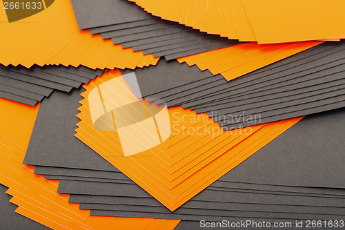 Image of Black and orange sheets paper