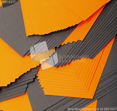 Image of Black and orange sheets paper