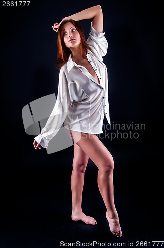 Image of young sexy woman in white shirt