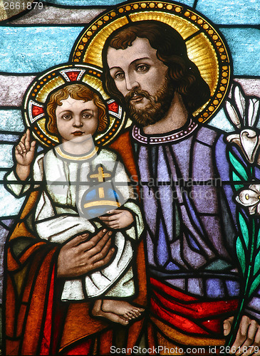 Image of Saint Joseph holding baby Jesus