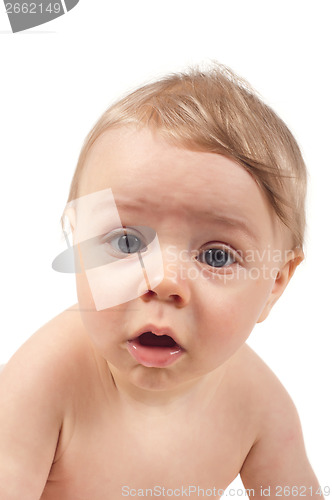 Image of Serious baby watching in camera