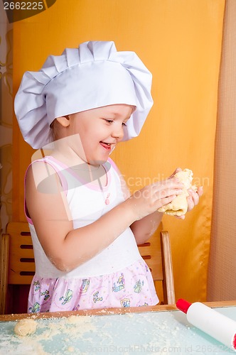 Image of baby girl in cook role