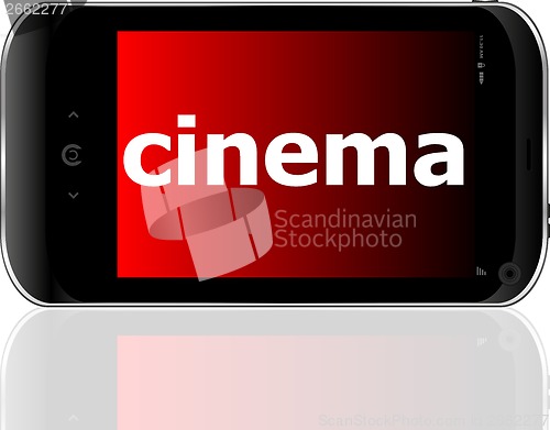 Image of Web development concept: smartphone with word cinema on display