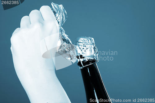 Image of Opening champagne bottle