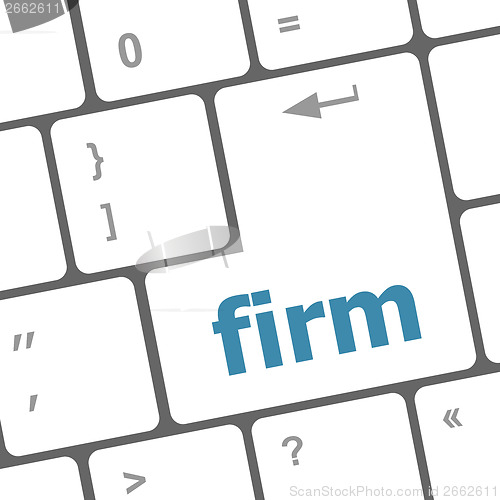 Image of firm word on keyboard key, notebook computer button