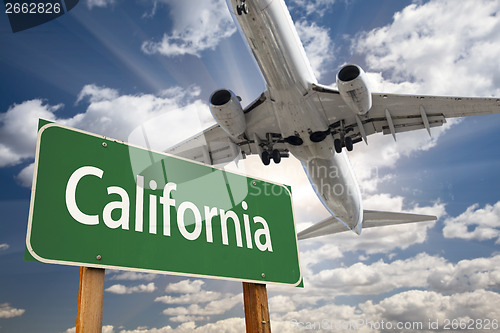 Image of California Green Road Sign and Airplane Above