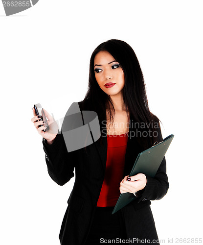 Image of Business woman with cell phone.