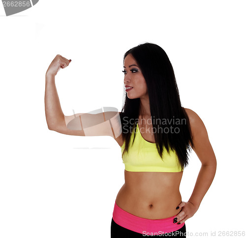 Image of Girl showing her biceps.