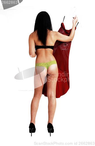 Image of Girl shoeing dress.