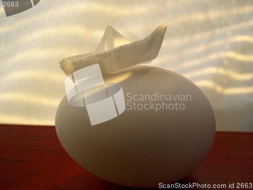 Image of egg & paper boat