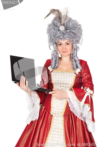 Image of Woman in queen dress with laptop