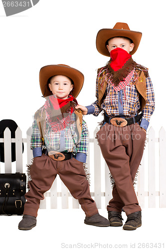 Image of Two boys in cowboy costumes