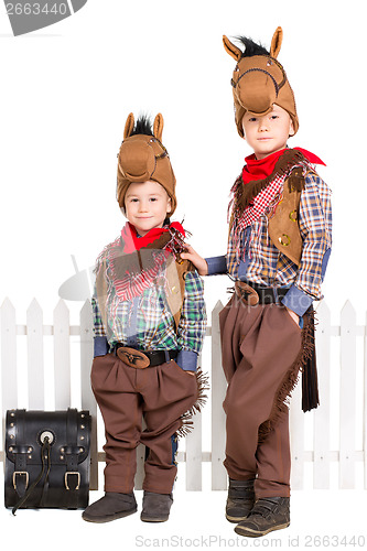 Image of Two boys in horse costumes