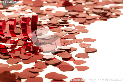 Image of Red hearts confetti on white background