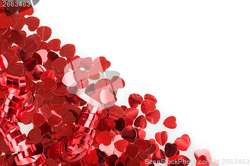 Image of Red hearts confetti on white background