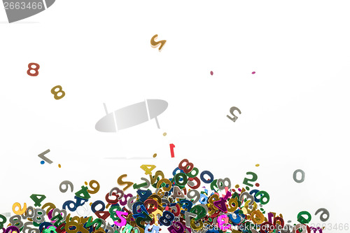 Image of small color numbers confetti on white