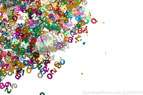 Image of small color numbers confetti on white