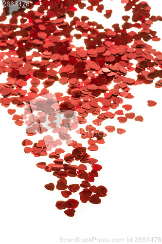 Image of Red hearts confetti on white background