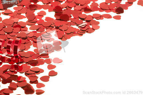 Image of Red hearts confetti on white background