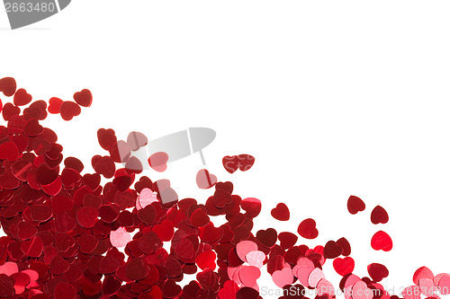 Image of Red hearts confetti on white background