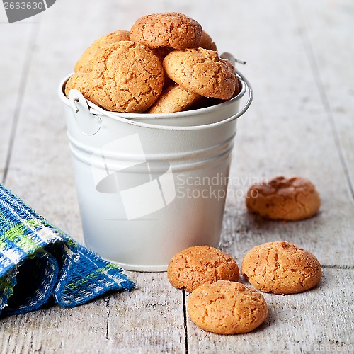 Image of meringue almond cookies in bucket 