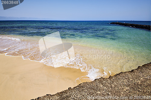 Image of spain harbor pier boat in the blue sky   arrecife teguise 