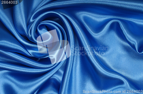 Image of Smooth elegant blue silk as background 