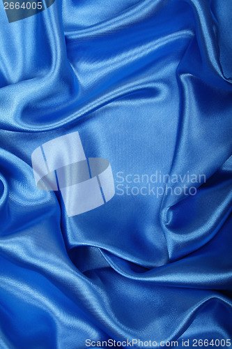 Image of Smooth elegant blue silk as background 