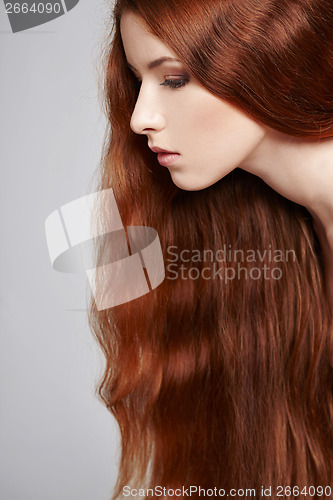 Image of Closeup of beautiful red headed woman