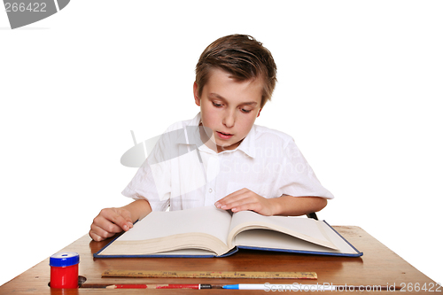 Image of School student reading a book.