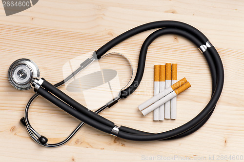 Image of Stethoscope and cigarette 