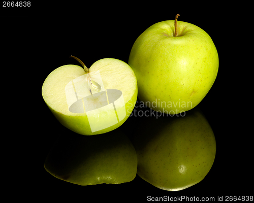 Image of apple on reflective ground