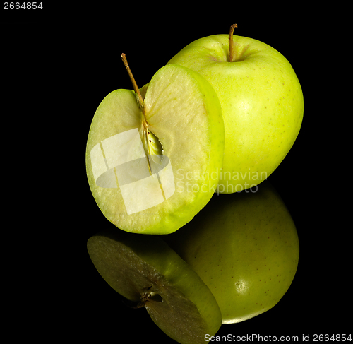 Image of apple on reflective ground