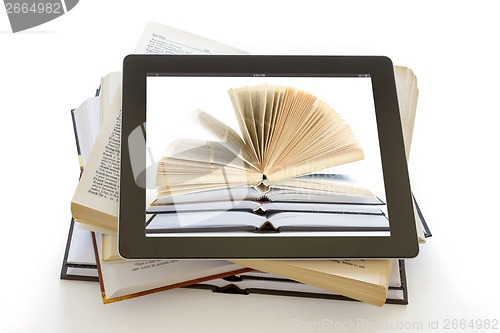 Image of Open Books on digital tablet concept