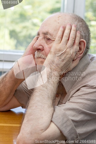 Image of senior man thinking