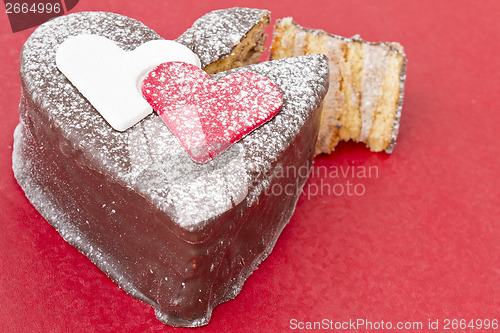 Image of Heart shaped slice of a chocolate-cake