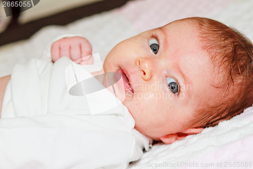 Image of Smiling newborn baby girl