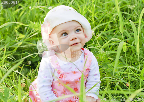 Image of Happy baby girl with blue eyes