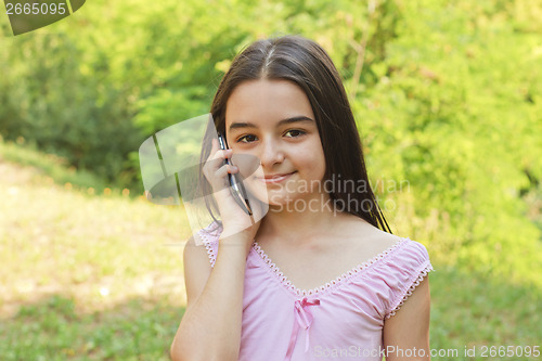 Image of Teenage girl with smartphone