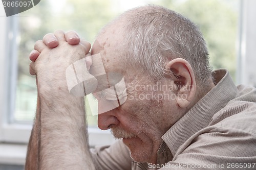 Image of Old man praying