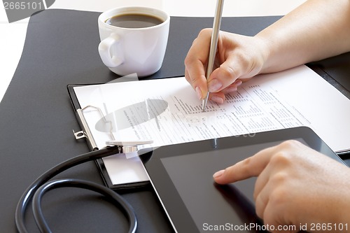 Image of Doctor with tablet computer