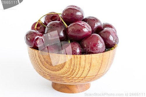 Image of Fresh Cherries in a wooden bowl