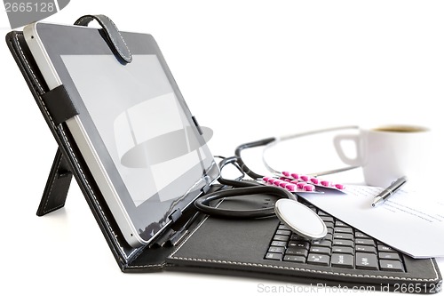 Image of Digital tablet pc, pills and stethoscope, health concept