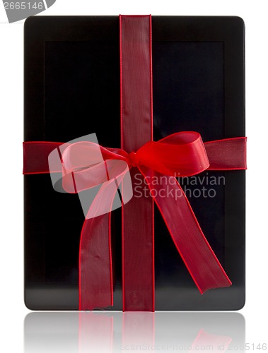 Image of Digital tablet with christmas present