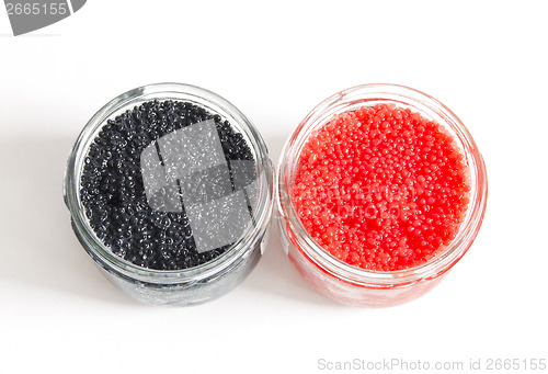 Image of red and black caviar in glass jars