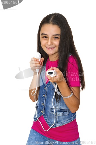 Image of teenage girl playing video games 