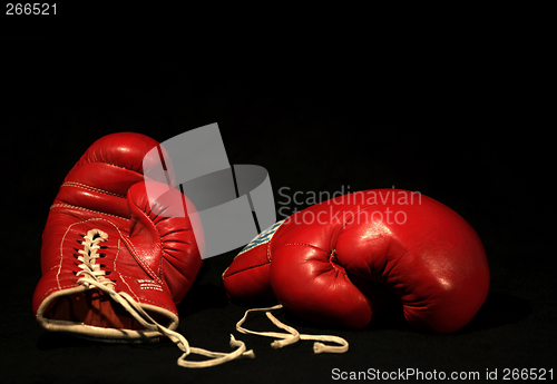 Image of two red boxing gloves