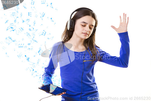 Image of Smiling girl listening to music