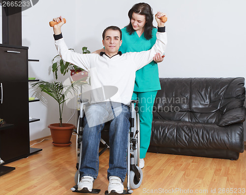 Image of Physical therapist working with patient