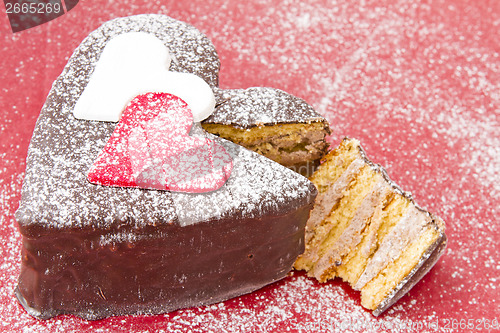 Image of Heart shaped slice of a chocolate-cake